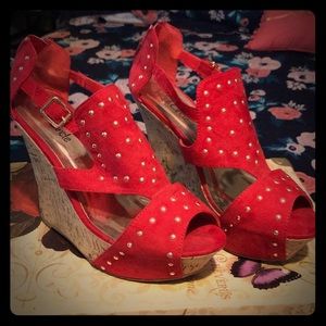 Red studded shoes
